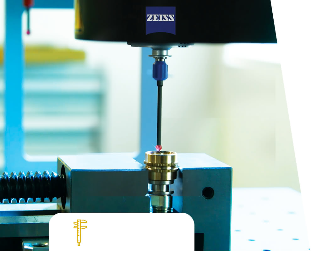 ZEISS O-Inspect coordinate/optical measuring machine in the metrology room, with a measuring probe inspecting a brass ring for quality control